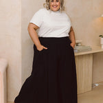 Model in Chic Women's Plus Size Black Pants - Maya Pants in Black