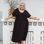 Curvy Model Wearing Womens Plus Size Dress in Black - Ashleigh Dress