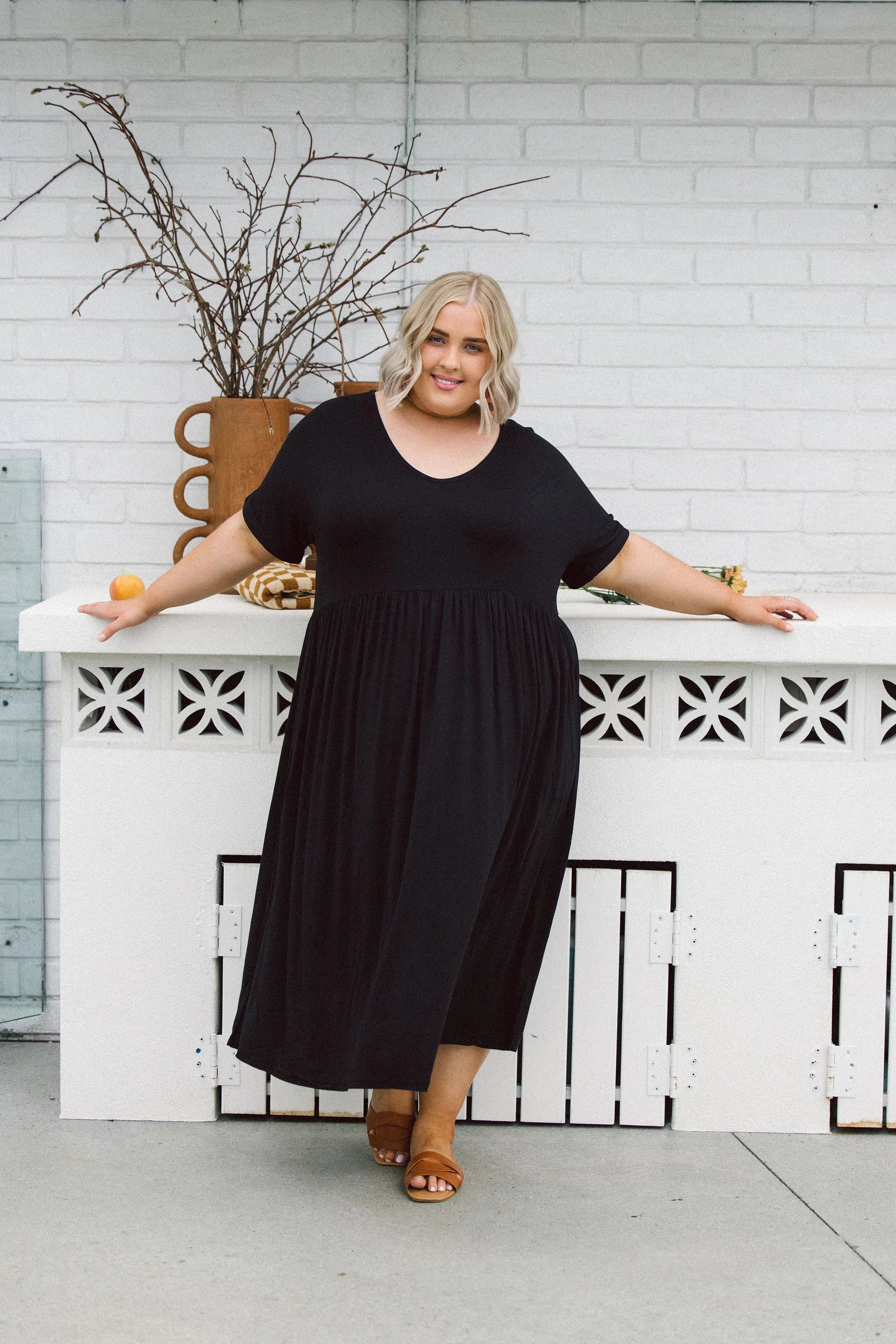 Curvy Model Wearing Womens Plus Size Dress in Black - Ashleigh Dress