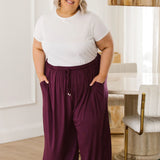 Model Wearing Women's Plus Size Pants - Darcy Pants in Berry